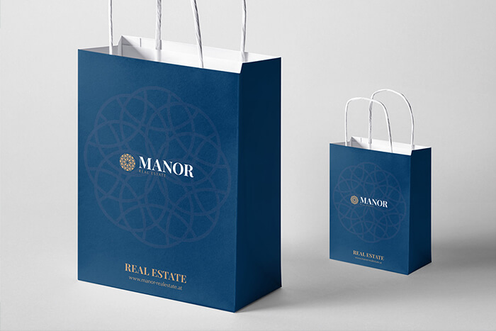 Produktová vizualizace papírových tašek pro realitní projekt Manor Real Estate